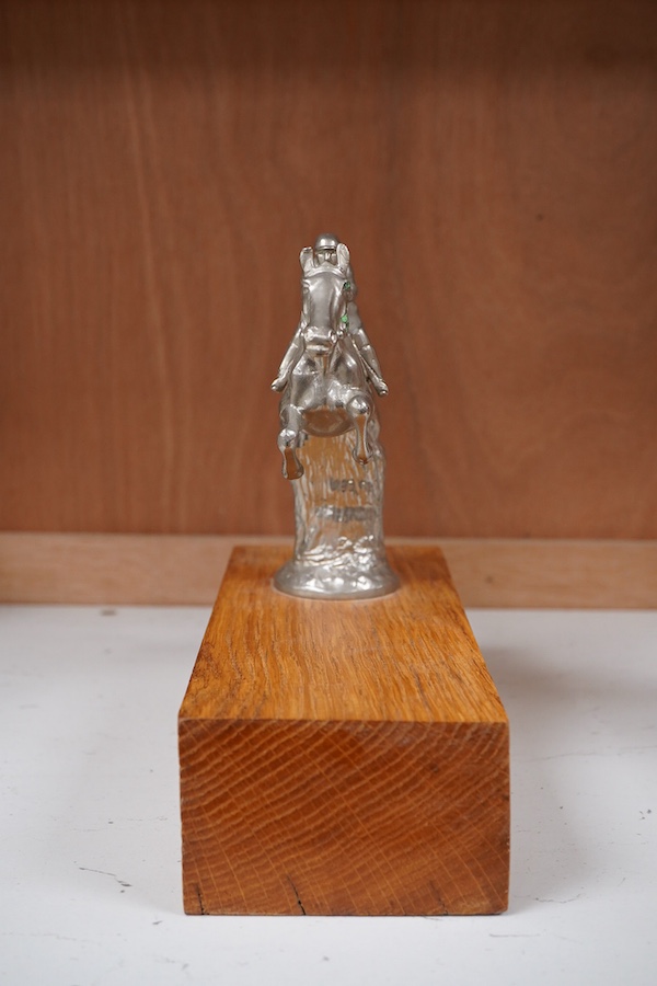 A chrome plated ‘jockey and horse’ car mascot, mounted, 18cm tall